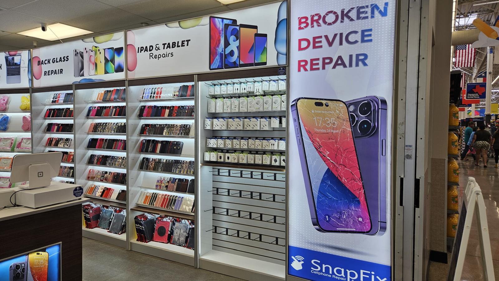 Talk N' Fix retail store display showcasing phone repair services and phone cases