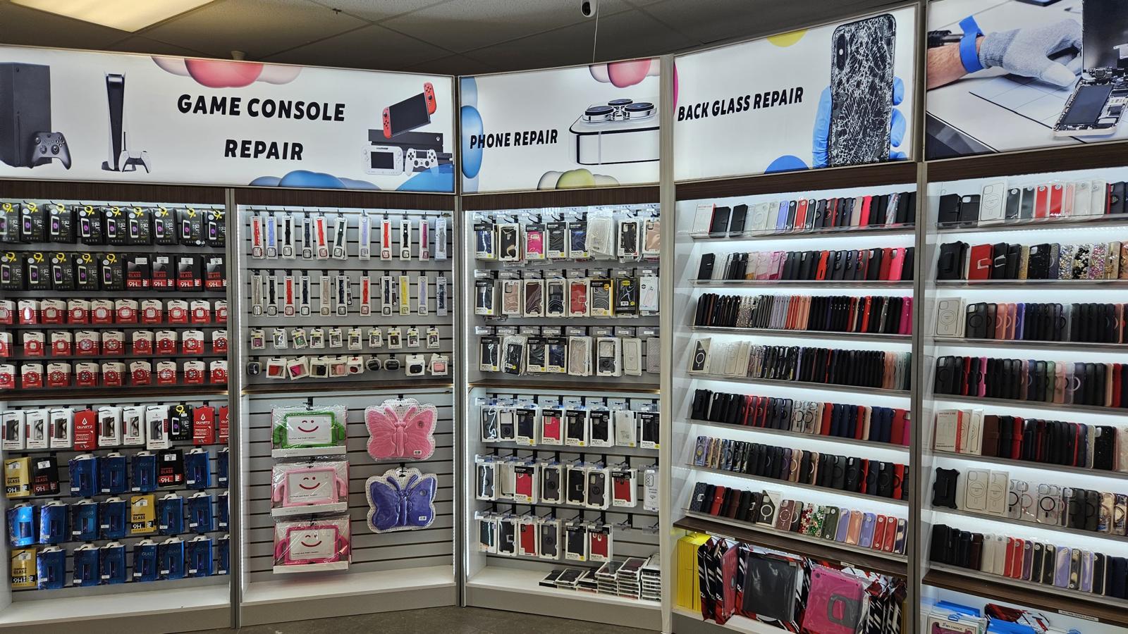 Talk N' Fix storefront display showing phone cases, chargers, and screen repair options